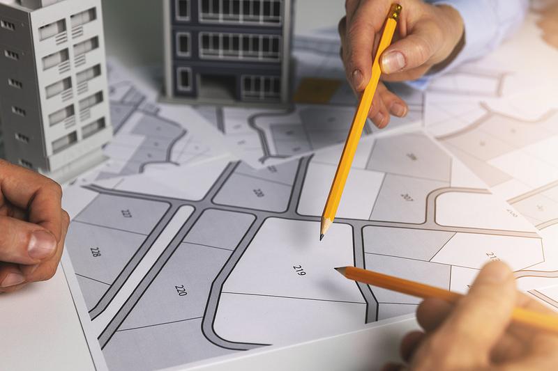 An urban planning team looks over their work.