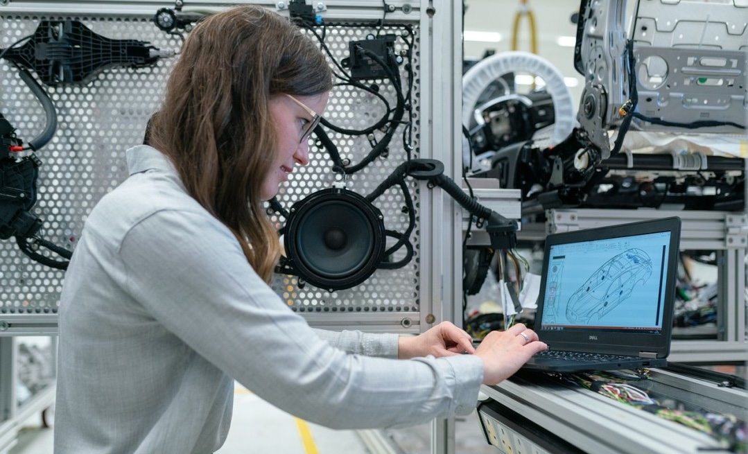 a Mechanical Engineer at work on a laptop software