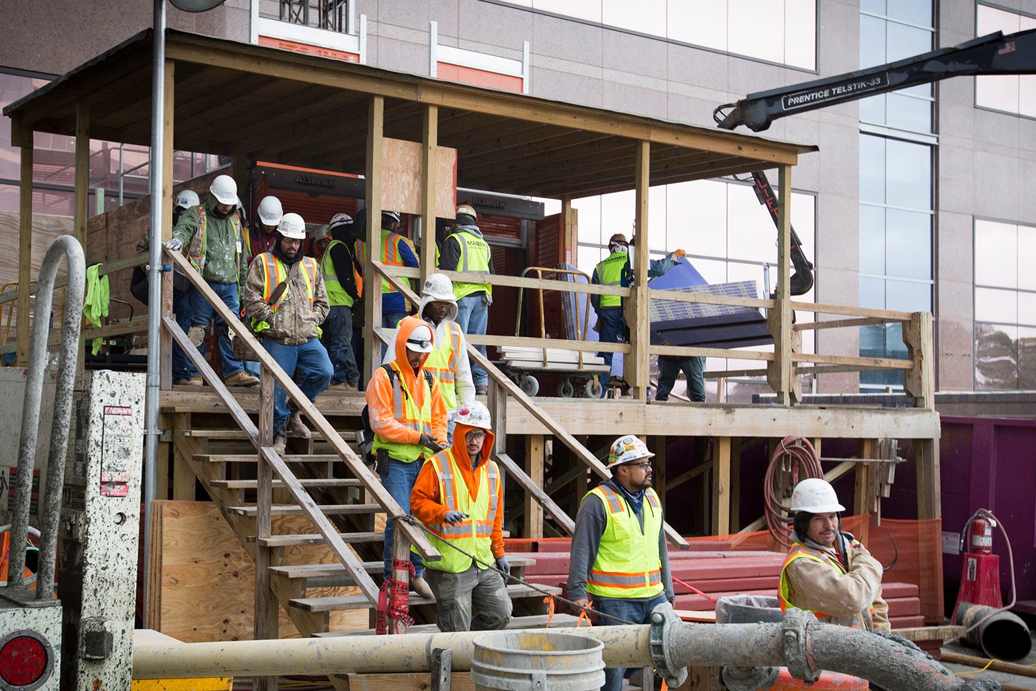 Construction workers take a break for lunch at a construction site for Texas Children's Hospital in Houston