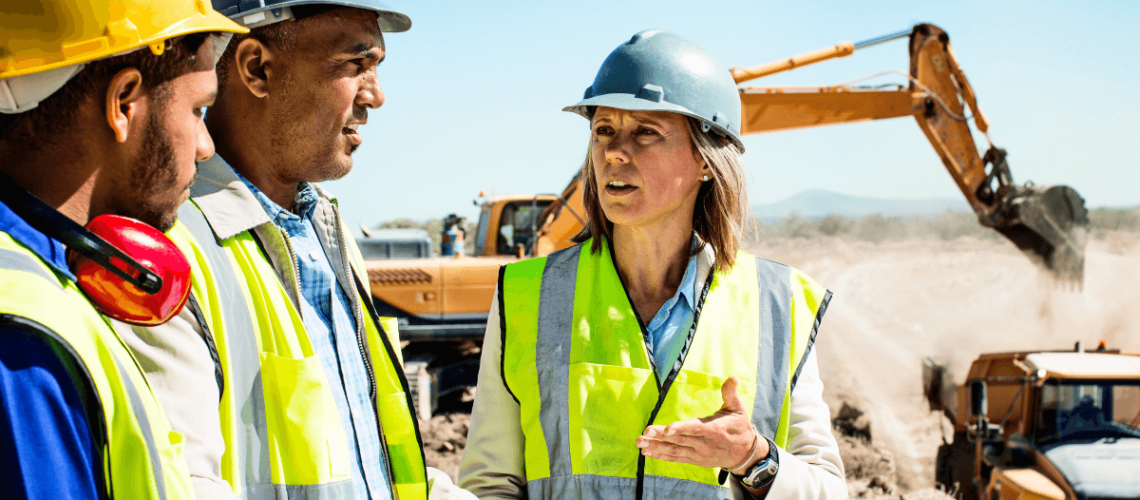 construction site with AEC professionals collaborating on a project